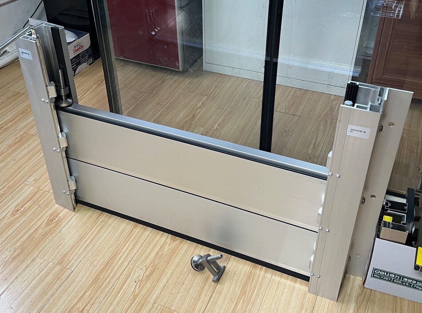 Close-up of BarrierX aluminum panels, EPDM seals, and compression hardware