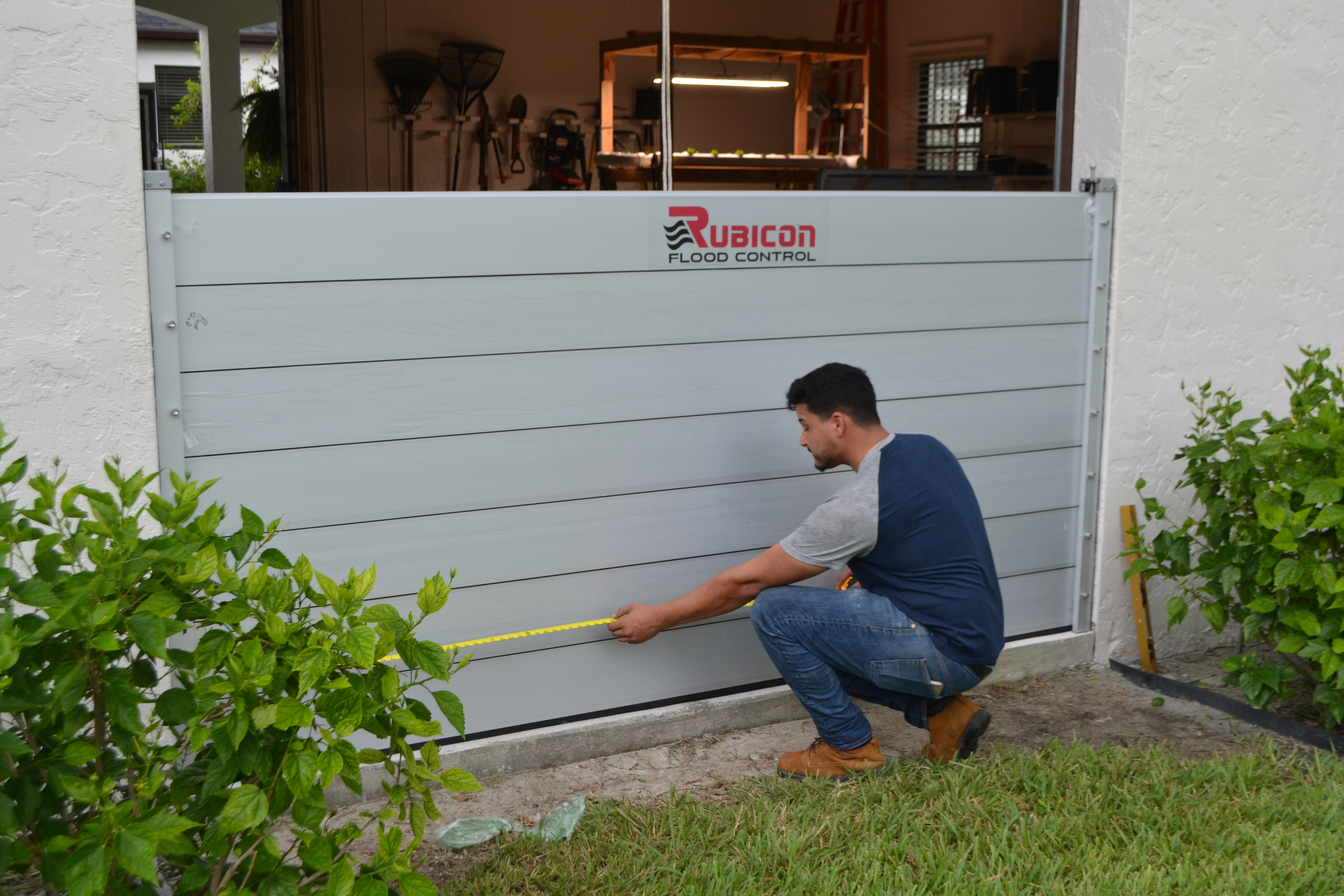 Close-up of Rubicon aluminum flood panels, seals, and compression hardware