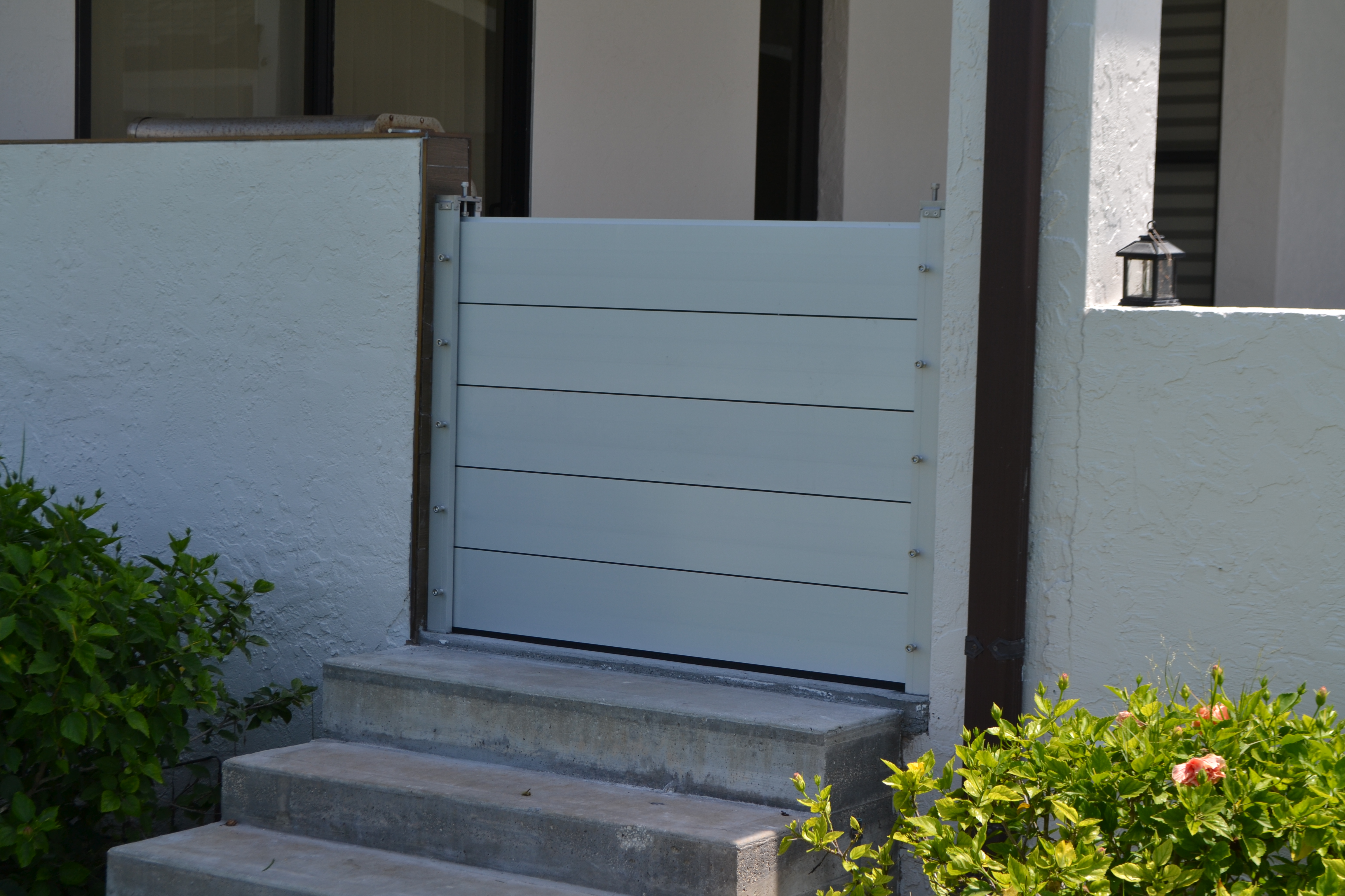 Clean Rubicon flood panel install across a residential threshold